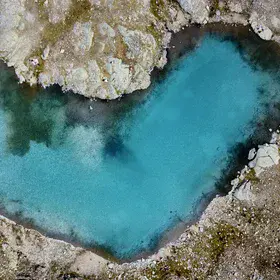 An azure heart over Italian Alps